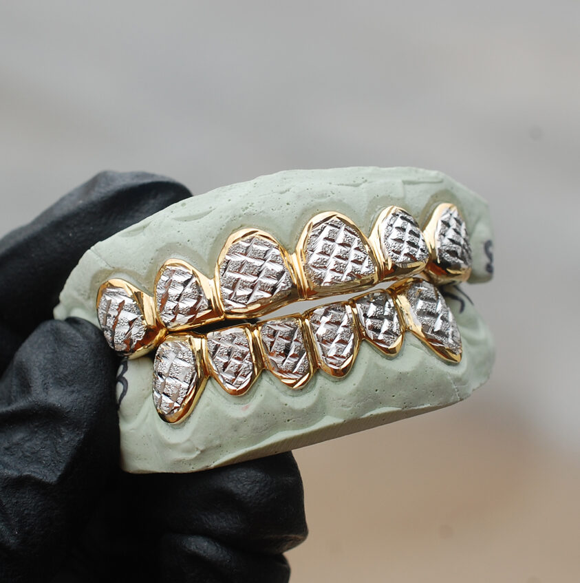 Yellow and White Gold Diamond Dust Cut Punchout Grillz GotGrillz