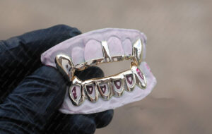 Yellow Gold Gap Bar Grillz K9 Fangs and Bottom Open Face Grillz - GotGrillz