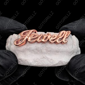 custom Gold cursive letter grillz